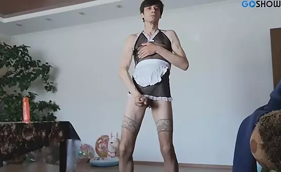 Crossdressing Maid Strokes Her Ass with a Dildo
